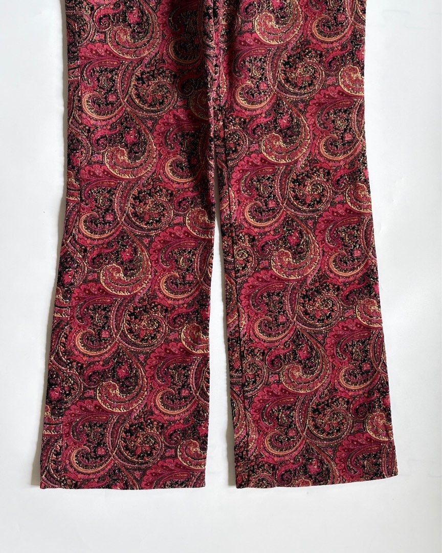 SAINT & MARTN Paisley Flare Pants (Category: Other Bottoms) located in Tarlac. Submitted by kr_closet (Listing ID 1444013055, Image 3). Description: - Cool paisley print pants from SAINT & MARTN. - Features a stylish flare leg. - Fabric has a subtle sheen for added flair. - Designed for a statement-making look. - Convenient button and zip closure at the front..