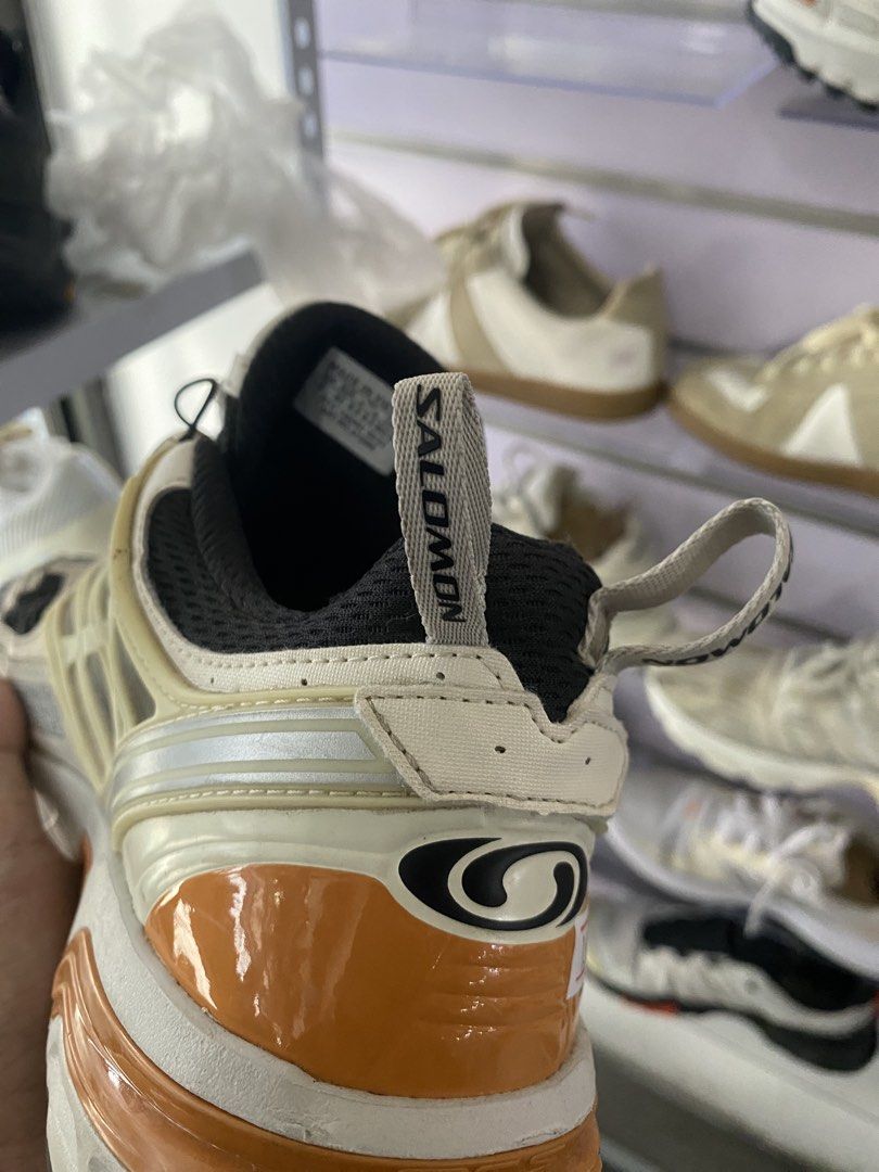 Salomon XT-6 Trail Running Shoes (Category: Sneakers) located in Manila. Submitted by hell_market (Listing ID 1443963100, Image 2). Description: - Salomon XT-6 Sneakers - Color: Cream and Orange - Size: UK 8 / EUR 42 / US M 9.5 - Made in Vietnam - Features Ortholite insole - Perfect for trail running or everyday wear - Please check photos for condition details.