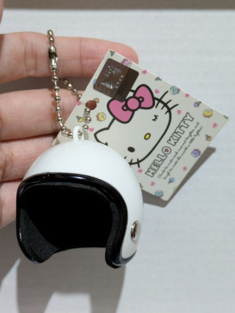 Sanrio Hello Kitty Mini Motorcycle Helmet Keychain Charm (Category: Character Goods) located in Batangas. Submitted by mirajane._ (Listing ID 1444088529, Image 2). Description: Official Sanrio Hello Kitty Mini Helmet Keychain 🤍 Adorable Hello Kitty keychain. 🤍 With original tag. 🤍 Authentic Sanrio product. This item is lightweight. Actual photos posted. Kindly set your expectations accordingly. What you see is what you get. Please review the a