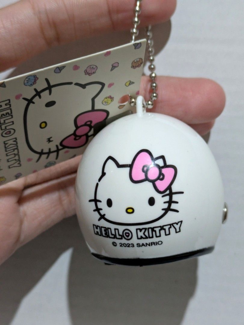 Sanrio Hello Kitty Mini Motorcycle Helmet Keychain Charm (Category: Character Goods) located in Batangas. Submitted by mirajane._ (Listing ID 1444088529, Image 1). Description: Official Sanrio Hello Kitty Mini Helmet Keychain 🤍 Adorable Hello Kitty keychain. 🤍 With original tag. 🤍 Authentic Sanrio product. This item is lightweight. Actual photos posted. Kindly set your expectations accordingly. What you see is what you get. Please review the a