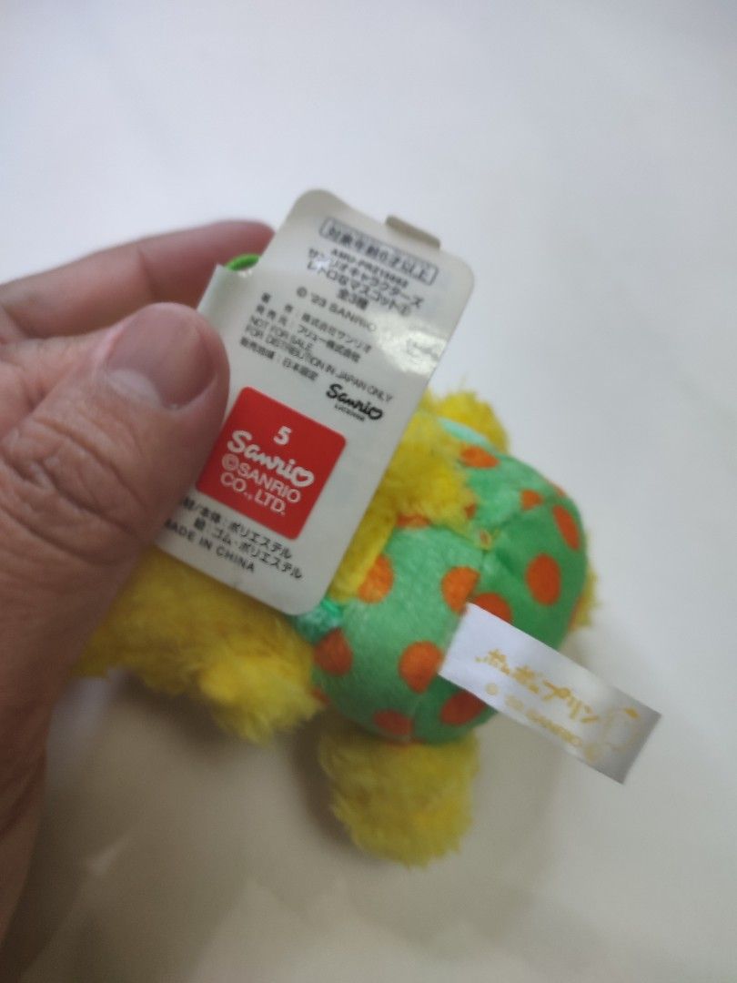 Sanrio Pompompurin Plush Toy Keychain (Category: Plushies & Soft Toys) located in Manila. Submitted by epicmountain-f20453 (Listing ID 1444108259, Image 2). Description: - Adorable Pompompurin plush toy with keychain - Features the cute yellow dog character - Dressed in a green polka dot outfit and orange hat - Ideal for Sanrio and Pompompurin enthusiasts - Great for decorating bags, backpacks, or purses - Small and portable size - Comes with ori