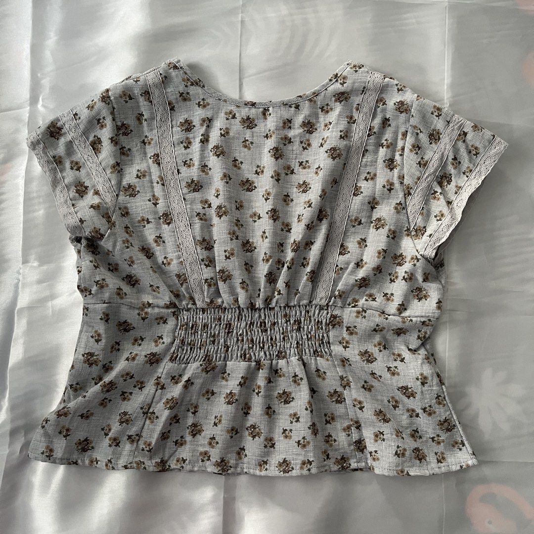 SHEIN Boho Floral Embroidered Top (Category: Blouses) located in Antipolo. Submitted by lacekeepsakes (Listing ID 1444001945, Image 2). Description: 🌷 condition: brand new; never used. 🌷 fit: slim 🌷 design details: floral print; contrast lace trim; button-front detail; smocked back panel 🌷 fabric: woven 🌷 material: 100% polyester 🌷 size: medium 🌷 issues/flaws: none observed the blouse has been kept carefully and remains in very good condit