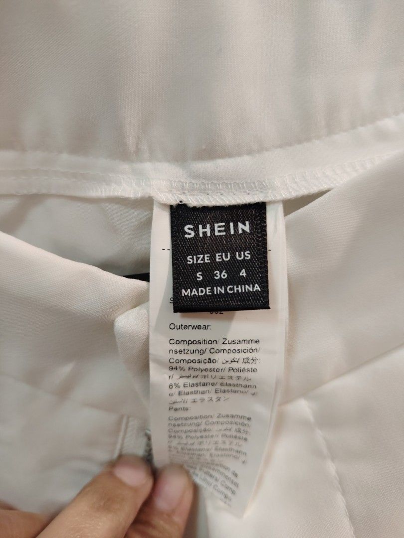 SHEIN White Wide Leg Pants Size S (Category: Other Bottoms) located in Caloocan City. Submitted by jaylynm (Listing ID 1443964910, Image 2). Description: - SHEIN White Wide Leg Pants - Size: S - Material: Polyester & Elastane Blend - Fit: Comfortable and flowy - Versatile: Great for casual or dressed-up looks - Easy to pair with any top.