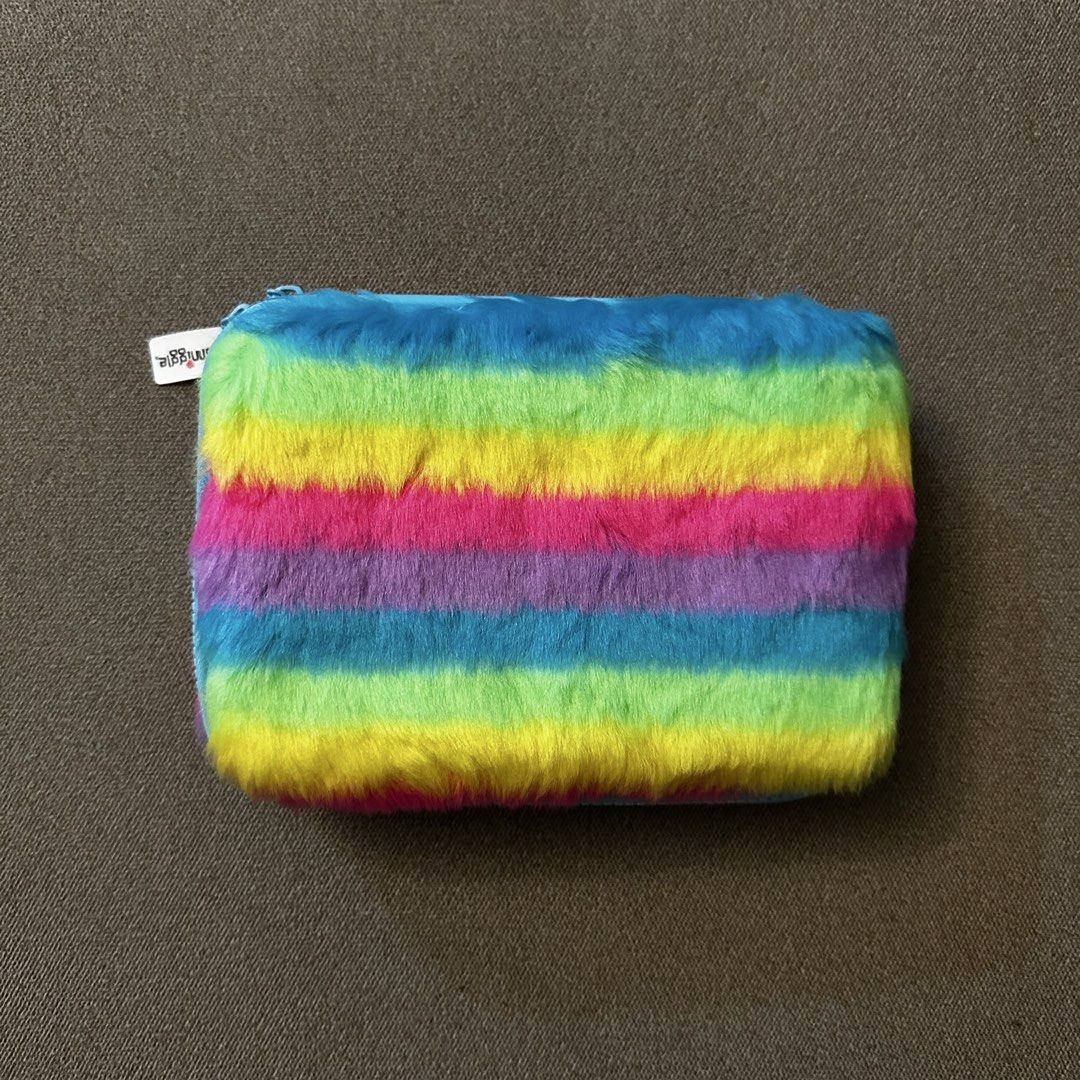 Smiggle Rainbow Furry Bear Pencil Case (Category: Stationery & School Supplies) located in Batangas. Submitted by veevasclutter (Listing ID 1444060223, Image 2). Description: • Smiggle rainbow fur pencil case • interior compartments for pens and a mesh pocket • secure zipper closure • for school or art supplies.