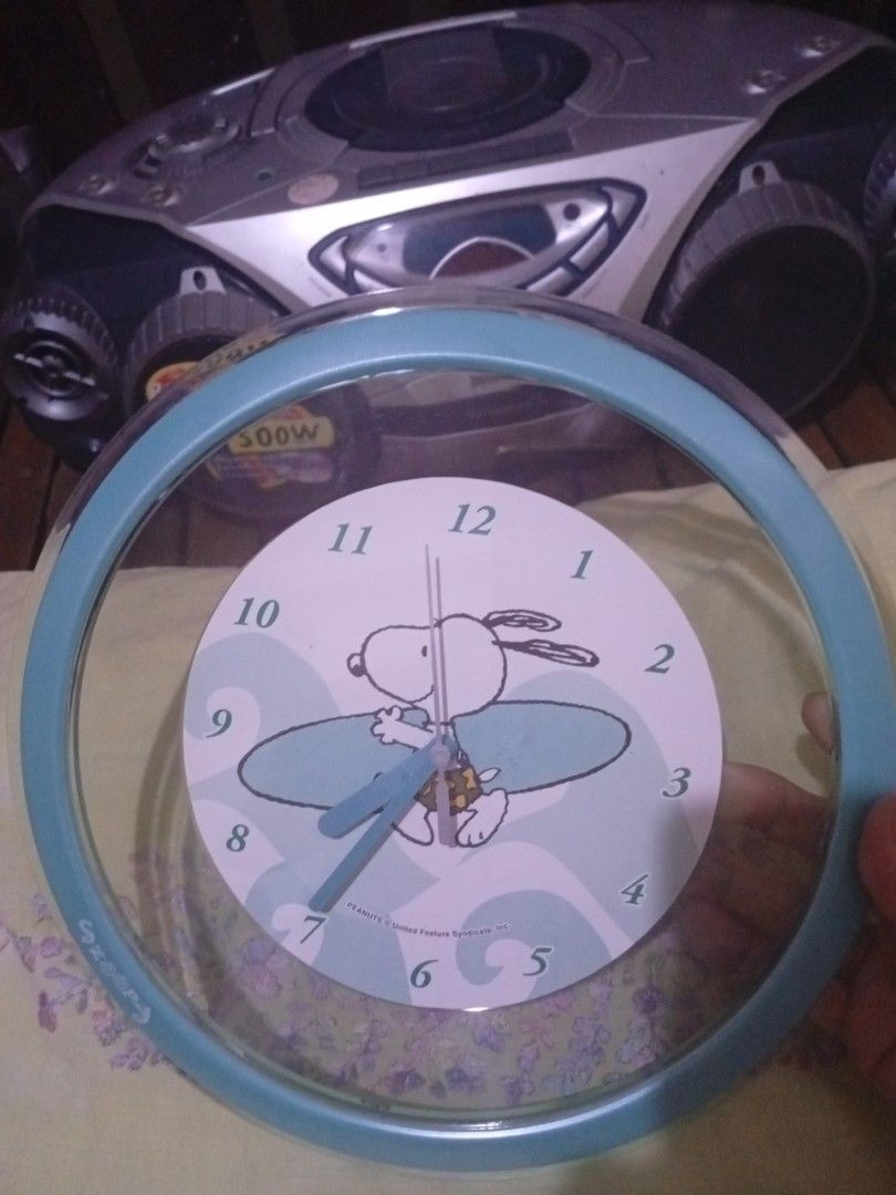 Snoopy Peanuts Wall Clock (Category: Clocks) located in Caloocan City. Submitted by lolacel (Listing ID 1444031441, Image 1). Description: Snoopy surfing design in Light aqua frame. uses AA batteries for for Snoopy enthusiasts or as a gift accurate timing, Clock mechanism visible from the back Japanese surplus.