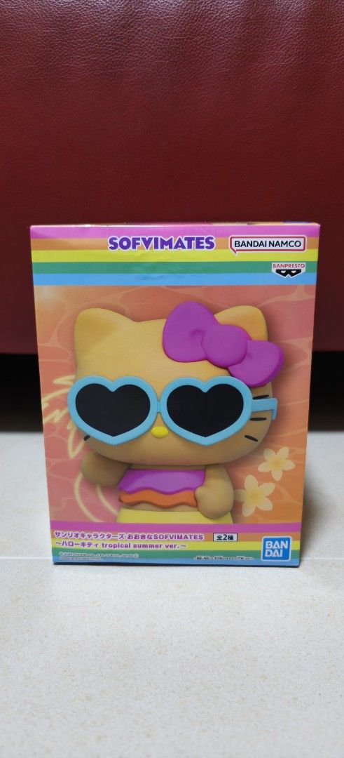 SOFVIMATES Hello Kitty Figure by Bandai Namco (Category: Designer & Blind Box Toys) located in Singapore. Submitted by bestbuysonly (Listing ID 1444067692, Image 1). Description: - SOFVIMATES Kitty Figure by Bandai Namco - Features Kitty wearing heart-shaped sunglasses - Comes in a colorful outfit - Box has rainbow accents and floral designs - Ideal collectible for Kitty fans -BNIB.