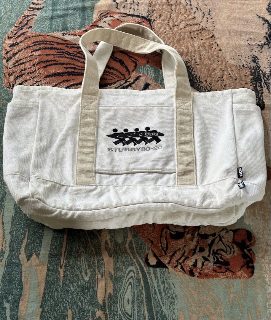 Stüssy x CDG canvas tote bag (Category: Luxury Bags & Wallets) located in Los Banos. Submitted by streetwear.collections (Listing ID 1444072827, Image 1). Description: Stüssy x CDG canvas tote bag Excellent condish Php 11,000 Thanks! .