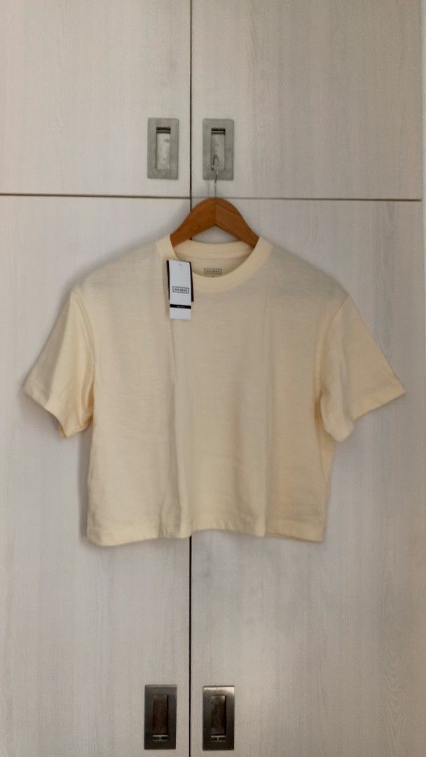 Surplus Biowear Cream Cropped T-Shirt (Category: Shirts) located in Marikina City. Submitted by cheantone (Listing ID 1443979993, Image 1). Description: Bust | 21" Shoulder | 19" Length | 19".
