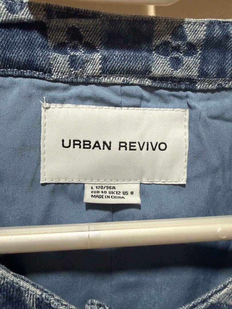 URBAN REVIVO Blue Monogram Denim Cropped Jacket (Category: Coats, Jackets and Outerwear) located in Caloocan City. Submitted by oceans18 (Listing ID 1444038565, Image 2). Description: - Cool blue denim jacket from Urban Revivo - Features a cool all-over monogram pattern - Cropped style with short sleeves - Button-up front with two chest pockets - Perfect statement piece for your wardrobe.