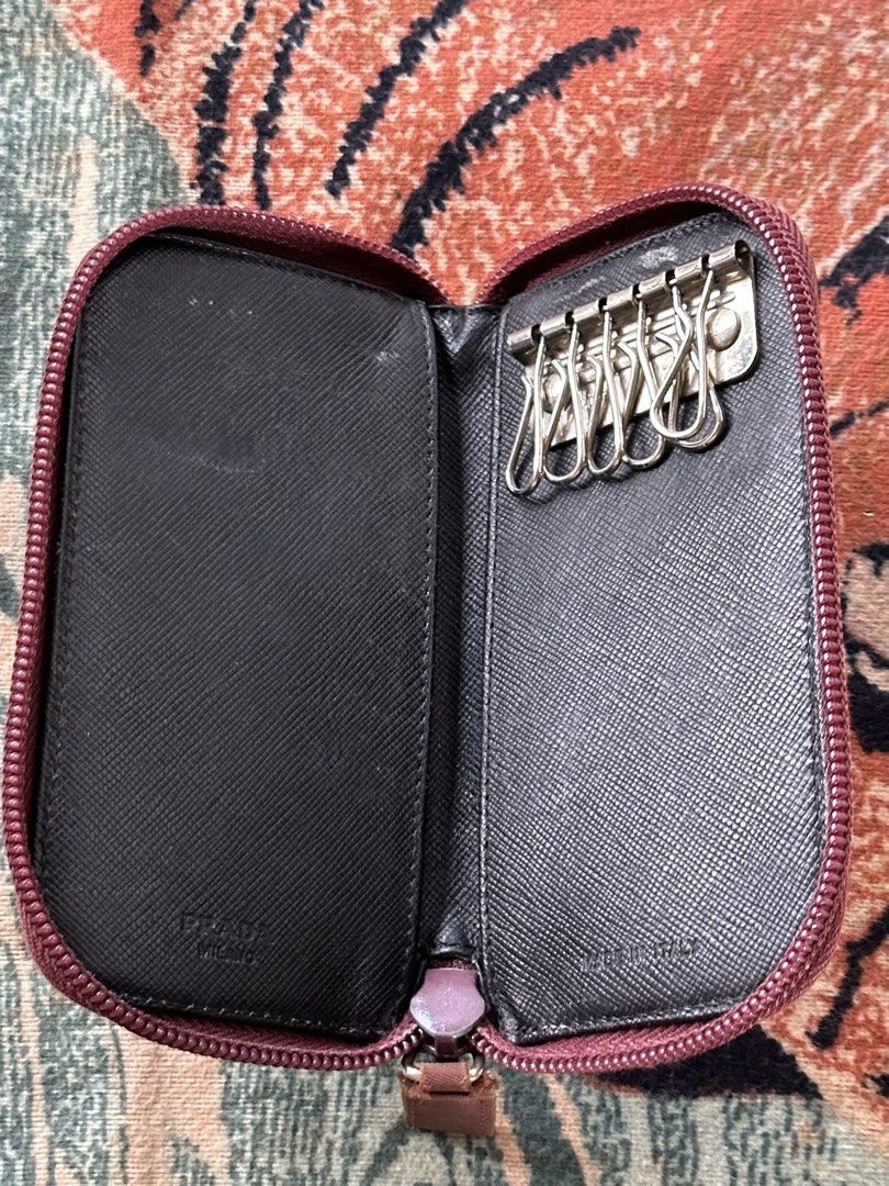 Vintage Prada card and keyholder (Category: Luxury Bags & Wallets) located in Los Banos. Submitted by streetwear.collections (Listing ID 1444075211, Image 2). Description: Vintage Prada card and keyholder Opti zipper Very good condition Fading Php 3,000 Thanks! .