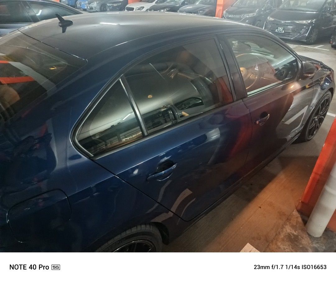 Volkswagen Jetta 1.4 Comfort TSI DSG (A) (Category: Used Cars) located in Singapore. Submitted by syammeow (Listing ID 1443972159, Image 3). Description: Selling a dark blue Volkswagen Jetta sedan. 2 years and 11 months left on the COE. 18 inch Original Rays Black wheels with tourador tyres. Comes with a front and back camera. Fitted with Android player. Leather interior with front and rear seats shown. New "mechatronics" changed when I first bou