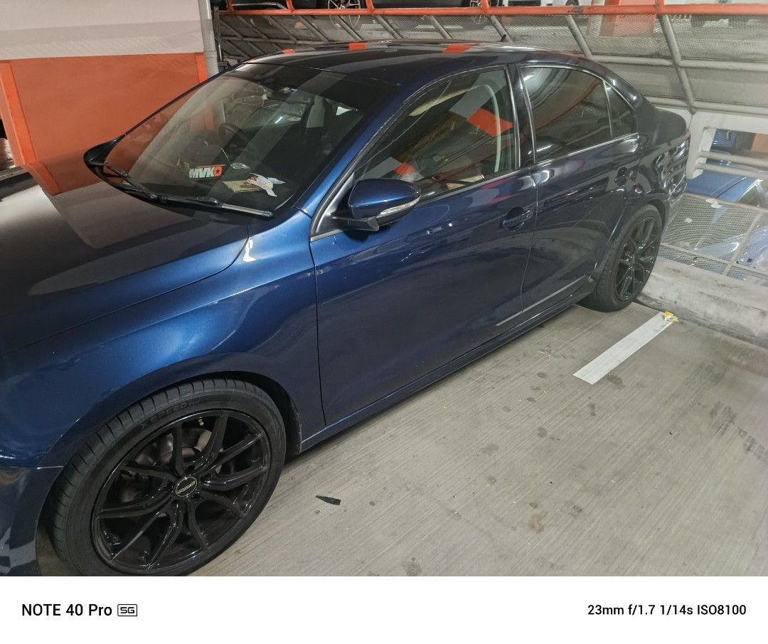 Volkswagen Jetta 1.4 Comfort TSI DSG (A) (Category: Used Cars) located in Singapore. Submitted by syammeow (Listing ID 1443972159, Image 2). Description: Selling a dark blue Volkswagen Jetta sedan. 2 years and 11 months left on the COE. 18 inch Original Rays Black wheels with tourador tyres. Comes with a front and back camera. Fitted with Android player. Leather interior with front and rear seats shown. New "mechatronics" changed when I first bou