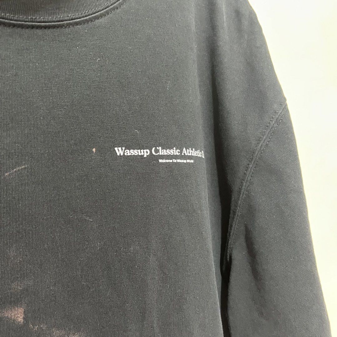 WASSUP Shirt in Black (Category: Tshirts & Polo Shirts ) located in Quezon City. Submitted by dakiclutter (Listing ID 1443913325, Image 2). Description: 🏷️ XL on Tag ❗️Flaws: Cracked Prints, Stains MOP: Gcash, Maribank Shipping schedule: Every thursdays-sundays.