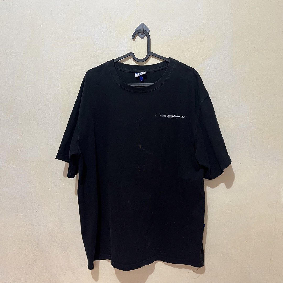 WASSUP Shirt in Black (Category: Tshirts & Polo Shirts ) located in Quezon City. Submitted by dakiclutter (Listing ID 1443913325, Image 1). Description: 🏷️ XL on Tag ❗️Flaws: Cracked Prints, Stains MOP: Gcash, Maribank Shipping schedule: Every thursdays-sundays.