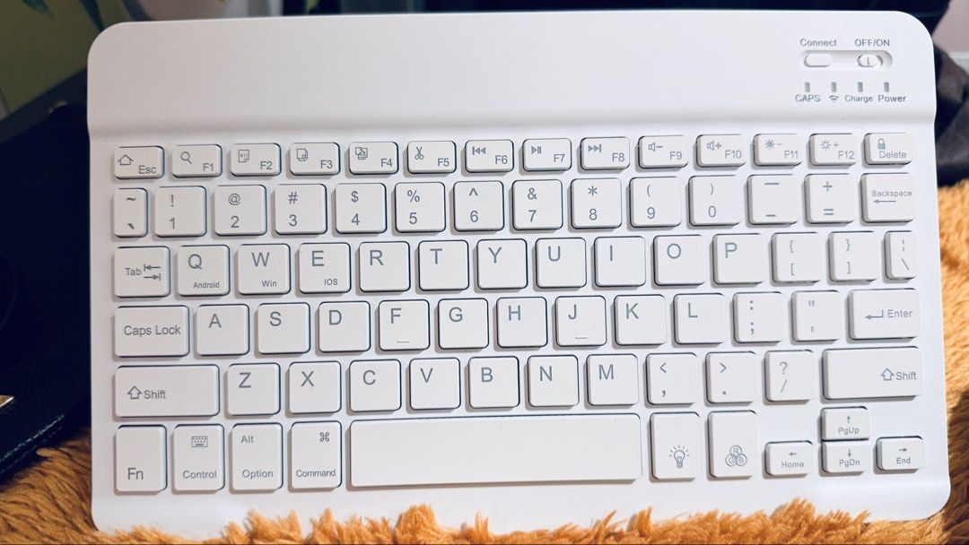 White Wireless Bluetooth Keyboard and Mouse Set (Category: Computer Keyboard) located in Zamboanga. Submitted by wildmoon.2026 (Listing ID 1444077708, Image 2). Description: - White wireless keyboard and mint green rechargeable mouse set - Bluetooth connectivity - Compatible with Android, Windows, and iOS devices - Keyboard features CAPS, Charge, and Power indicator lights - Ideal for convenient on-the-go typing and navigation.