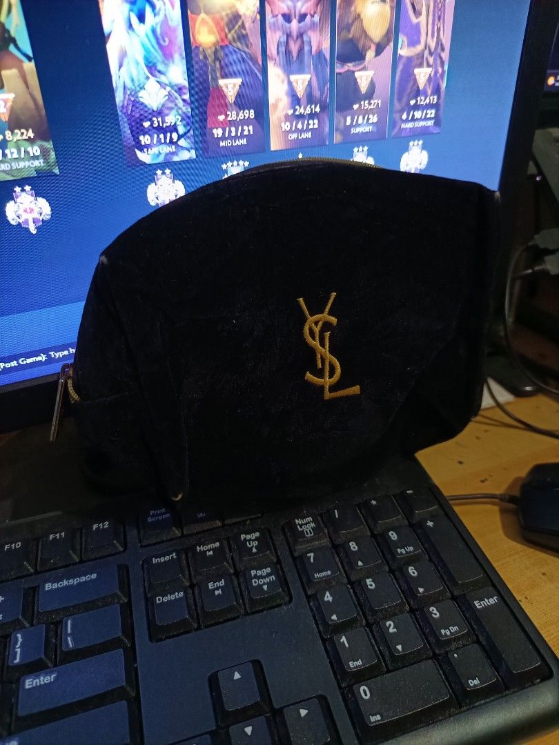 YSL complimentary bag (Category: Luxury Bags & Wallets) located in Cebu City. Submitted by negotiableprice22 (Listing ID 1444060396, Image 2). Description: YSL complimentary bag YSL cosmetics bag details: Front logo is embroid You can see the tag inside You can see the brand on the zipper have sign of usage flaws still in very good condition.
