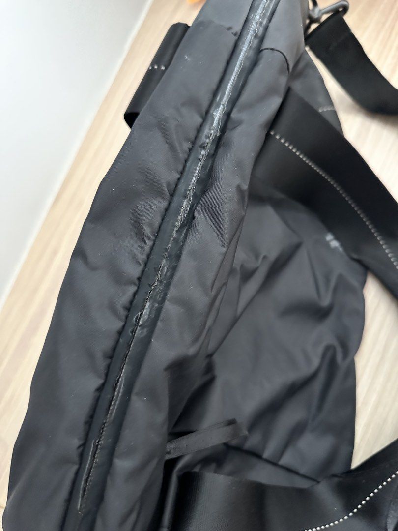 Adidas Black Nylon duffel bag running bag with Multiple Compartments (Category: Backpacks) located in Caloocan City. Submitted by kianoto (Listing ID 1444155877, Image 3). Description: - Durable black nylon backpack - Spacious main compartment - Multiple internal pockets for organization - Secure zipper closure - Adjustable straps for comfortable carrying - Ideal for everyday use or travel Minor flaw on zipper rubber cover, looks like being stret