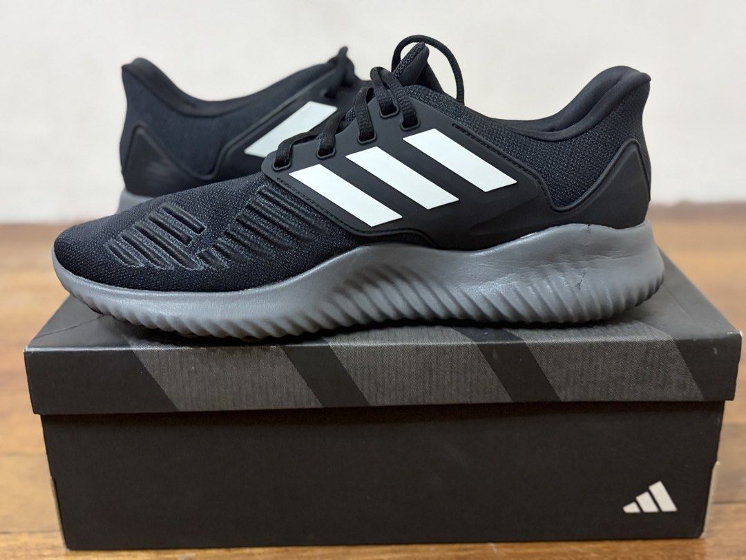 Adidas Running Shoes Black White BOUNCE (Category: Casual Shoes) located in Quezon City. Submitted by pinky600 (Listing ID 1444290556, Image 3). Description: - Black Adidas running shoes - White stripes - BOUNCE technology for comfort - Original box included - Ideal for training or casual wear.