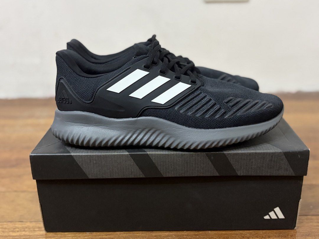 Adidas Running Shoes Black White BOUNCE (Category: Casual Shoes) located in Quezon City. Submitted by pinky600 (Listing ID 1444290556, Image 2). Description: - Black Adidas running shoes - White stripes - BOUNCE technology for comfort - Original box included - Ideal for training or casual wear.