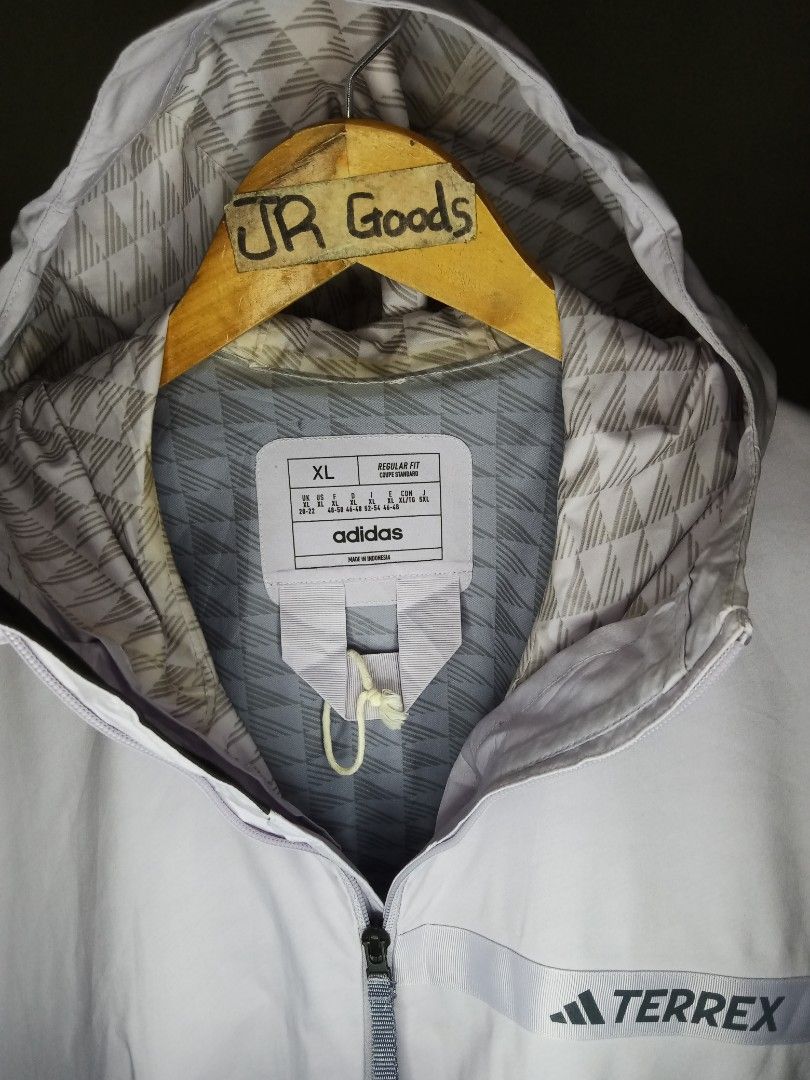 Adidas Terrex rain.rdy Hooded Jacket XL (Category: Coats, Jackets and Outerwear) located in Tanay. Submitted by jrgoods (Listing ID 1444265494, Image 2). Description: ADlDAS TERREX RAIN.DRY windbreaker Fits medium to large Dimes: 23.5/27-28 Excellent to new condition 950+ship Tanay Rizal location Shipping Nationwide - Size: XL - RAIN.RDY technology for water resistance - Two-tone design: Light Purple & Grey - Hooded for extra protection - Ideal f