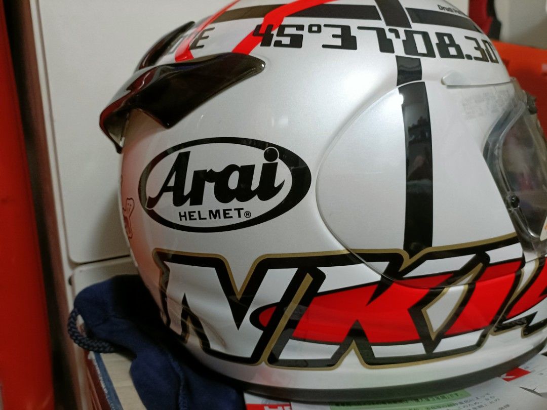 Arai Quantum-J Haga Monza fast Deal $650 nego (Category: Motorcycle Apparel) located in Singapore. Submitted by edot77 (Listing ID 1444282153, Image 3). Description: - Arai Quantum-J Helmet - "Nitro Nori" graphic with fun snail rider - Size: M (57-58 CM) - Certifications: SNELL & PSC -Brand New ,only once try & keep it - Origin: Made in Japan - Visor: Clear visor included - Ideal for: Track days & street riding .