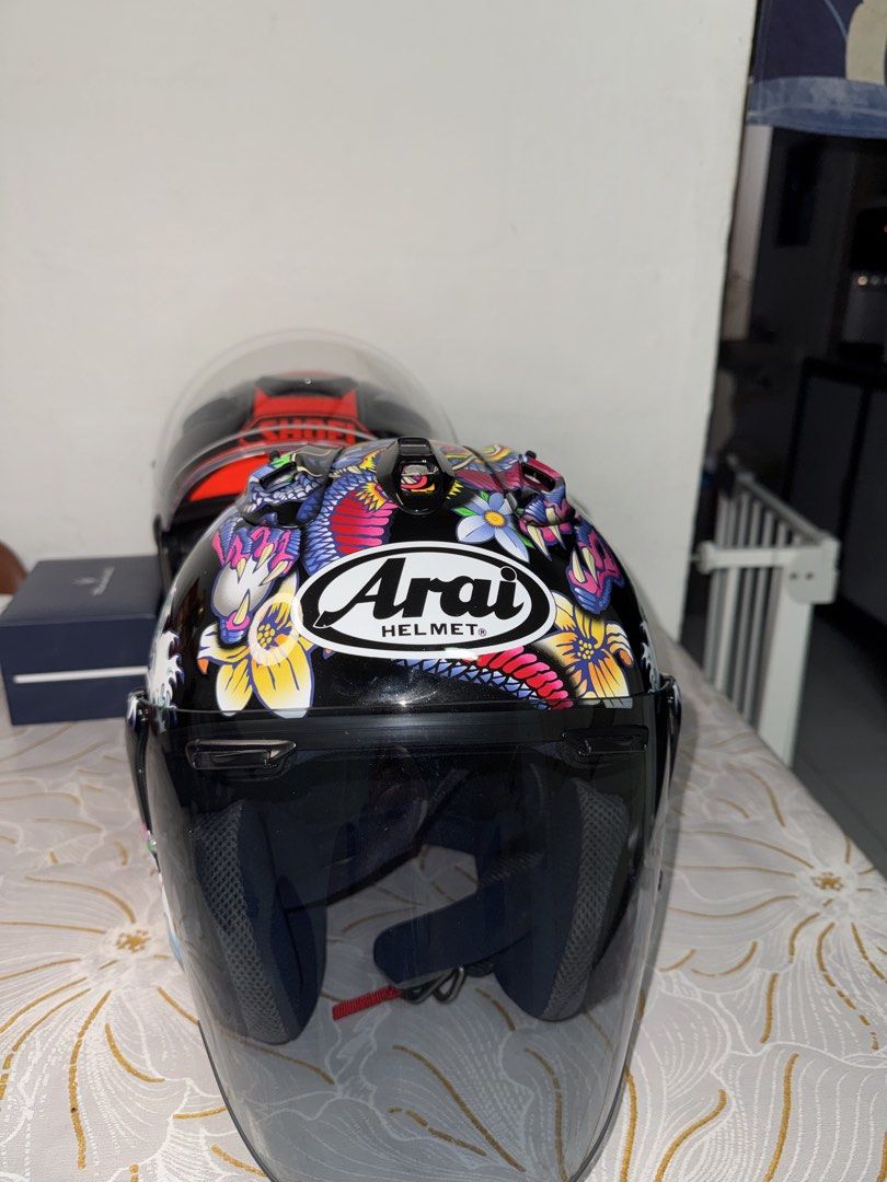 Arai VZ-Ram Tattoo Series Helmet (Category: Motorcycle Apparel) located in Singapore. Submitted by n.nabila25 (Listing ID 1444232245, Image 1). Description: - Arai VZ-Ram Helmet - Unique Japanese tattoo design (koi fish & waves) - Clear visor included - Stylish and functional for riders - Stand out on your rides! - Size M (Used 4 times only!) - Selling @ 750 , Able to nego! offer me your best price, but no lowball!.