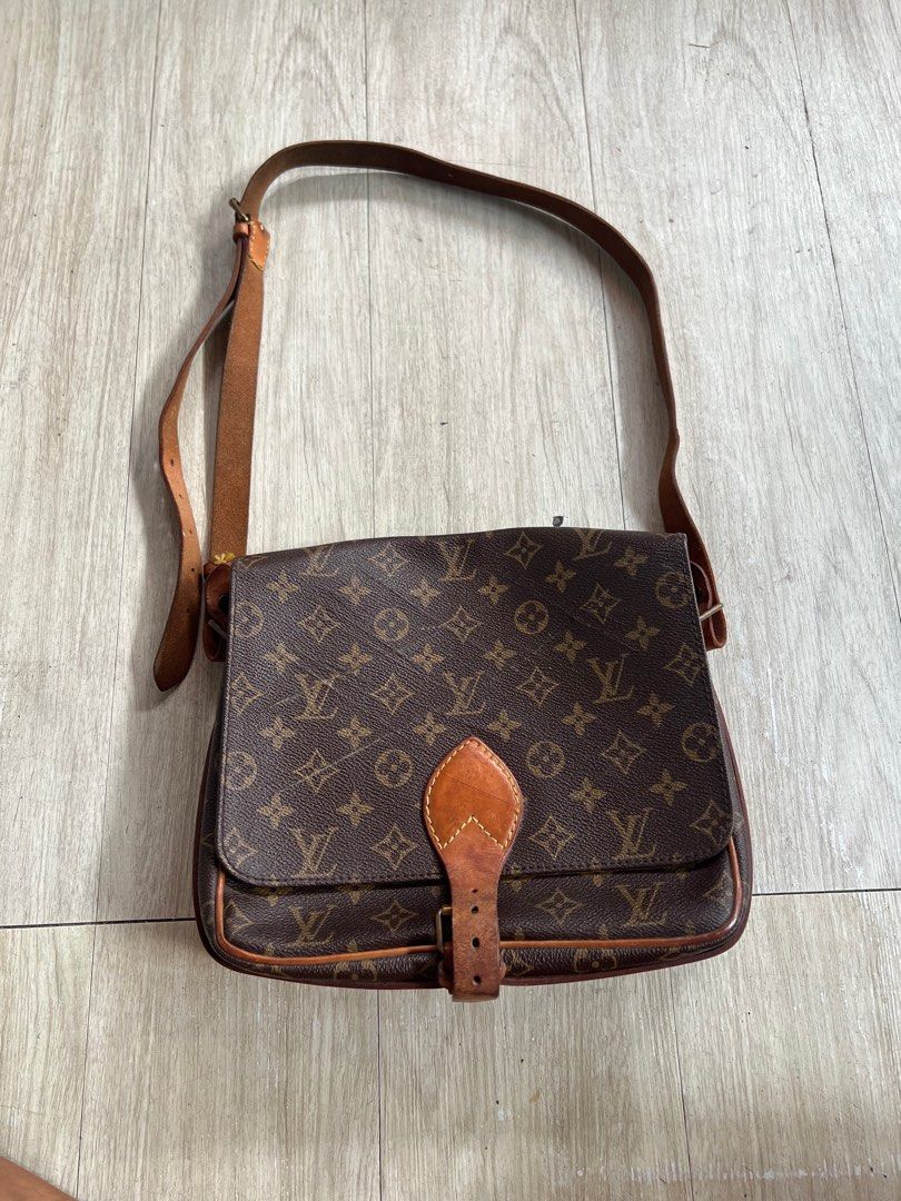 Authentic Louis Vuitton Cartouchiere GM Shoulder Bag (Category: Luxury Bags & Wallets) located in San Antonio. Submitted by kimbags (Listing ID 1444261107, Image 1). Description: Guaranteed authentic May mejo deep scratches sa harap paayos nuo na lang po. Aside from that maganda pa sya.