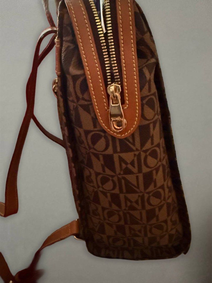 Authentic Monogram Backpack (Category: Backpacks) located in Singapore. Submitted by bagsarchive (Listing ID 1444265671, Image 3). Description: Brown Monogram Autentic W/ dustbag included Self collect at Yew tee, Jurong MRT STATION & Raffles. Or Arrange own delivery, we also can arrage lalamove. But depending on the location and prices..