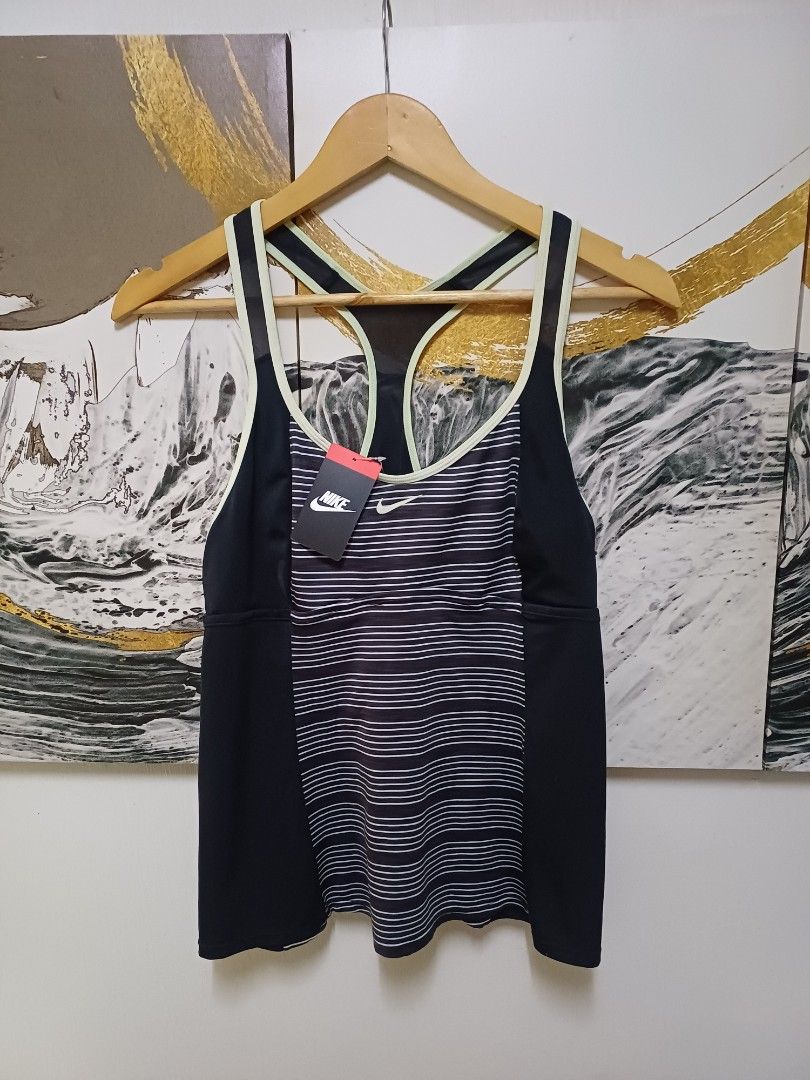 AUTHENTIC NIKE TANK TOP SUPER STRETCHABLE,Original Price Php 4,000 (Category: Activewear) located in Arayat. Submitted by angels_closet247 (Listing ID 1444191631, Image 2). Description: Actual size using inches Armpit to Armpit/ 16 Lenght/25 fittings is Large Excellent Condition, Issue:0 Message if you have any other question about sizing. We do shipping nation wide I'm also open for video call so that you can see the item you 're interested to b