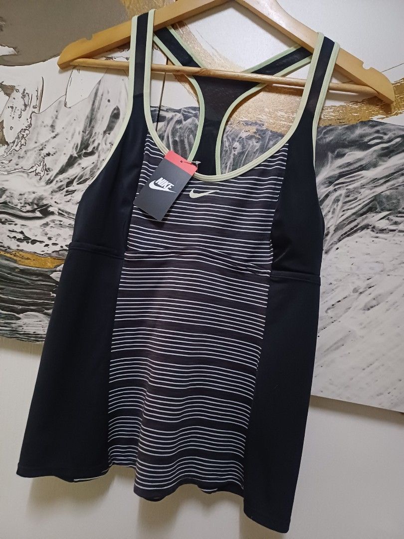 AUTHENTIC NIKE TANK TOP SUPER STRETCHABLE,Original Price Php 4,000 (Category: Activewear) located in Arayat. Submitted by angels_closet247 (Listing ID 1444191631, Image 3). Description: Actual size using inches Armpit to Armpit/ 16 Lenght/25 fittings is Large Excellent Condition, Issue:0 Message if you have any other question about sizing. We do shipping nation wide I'm also open for video call so that you can see the item you 're interested to b