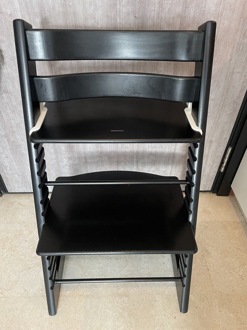 Authentic Stokke Tripp Trapp High Chair Black Oak with Baby Set white, Harness and Extended Gliders / Stokke Tripp Trapp High Chair Set with Stokke Tripp Trapp Baby Set (Category: Baby High Chairs) located in Singapore. Submitted by heisg (Listing ID 1444264565, Image 3). Description: A genuine Stokke Tripp Trapp High Chair in black oak, lightly used and well maintained. Crafted from durable oak with a textured matte finish, the iconic Tripp Trap
