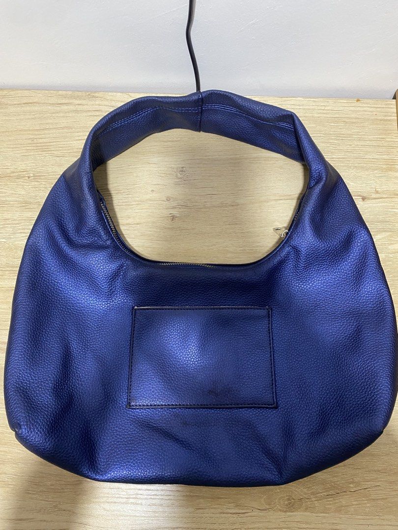 AZTRID Medium Hobo Bag (Metallic Blue) (Category: Shoulder Bags) located in Mandaluyong City. Submitted by ujimatchae (Listing ID 1444229576, Image 2). Description: AZTRID MEDIUM HOBO BAG IN METALLIC BLUE - in good condition (just needs cleaning) - can fit 11 inch ipad rfs: don't use it anymore MOP: Gcash MOD: Lalamove or JnT Loc: Quezon City.