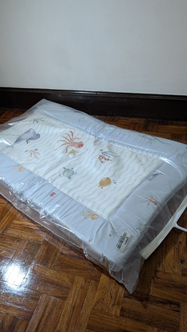Baby Changing Mat with Ocean Theme - Babybee (Category: Changing Mats & Accessories) located in San Juan City. Submitted by ptdy11 (Listing ID 1444149178, Image 2). Description: - Adorable ocean theme with whales, octopuses, and turtles. - Comes with a convenient reusable bag. - Ideal for diaper changes at home or while traveling. - Features an easy-to-clean surface. - Soft padding ensures baby's comfort. - Perfect for on-the-go convenience. - Sr