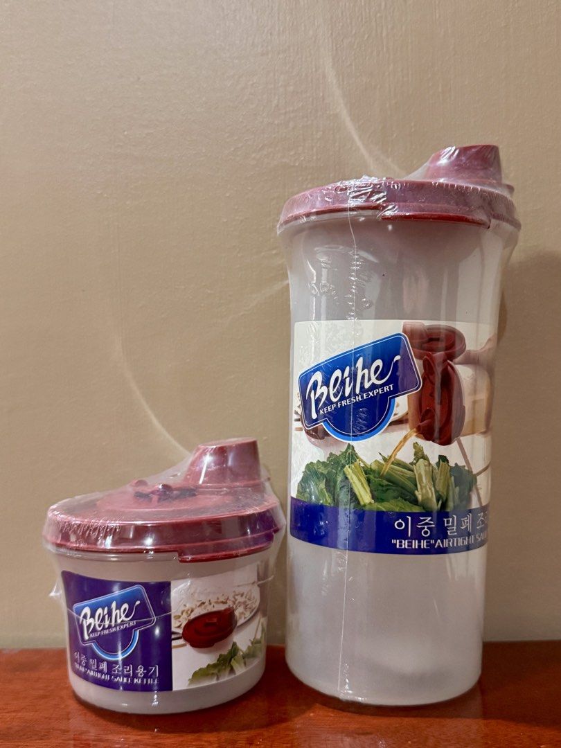 Beihe: Airtight Storage Containers Set (Category: Food Organization & Storage) located in Tayug. Submitted by pearly2124 (Listing ID 1444178214, Image 1). Description: - Selling as a set for 200.00 INCLUSIVE of shipping - Set of 2 Beihe airtight storage containers - Includes one smaller round container and one larger, taller container - Both feature red lids with convenient flip-top spouts - Brand new, still sealed in original plastic packaging -