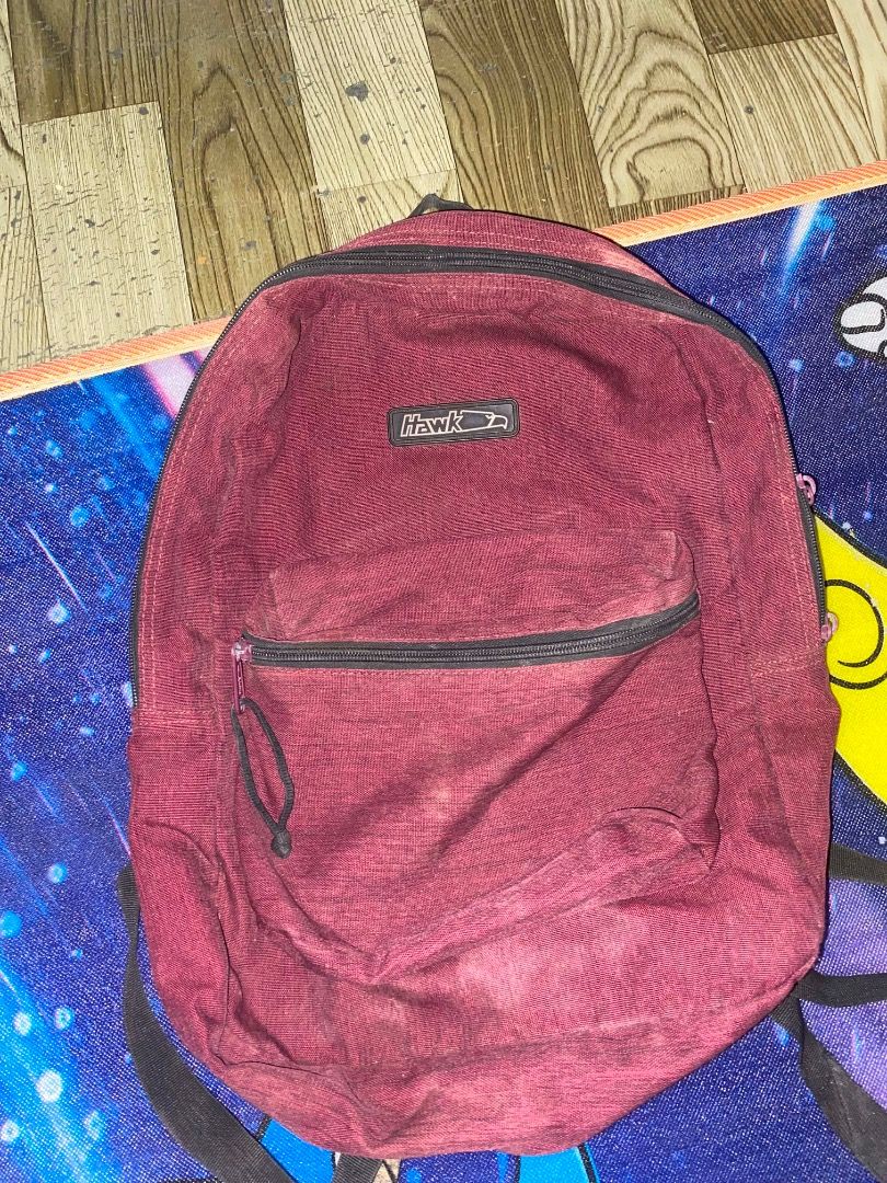 Black Backpack with Multiple Pockets (Category: Backpacks) located in Caloocan City. Submitted by jungkooklovebananamilk_0067 (Listing ID 1444153580, Image 2). Description: - Durable black backpack - Numerous pockets and zippers for organization - Spacious main compartment - Front pocket with secure buckles - Visible brand logo - Ideal for school or travel.