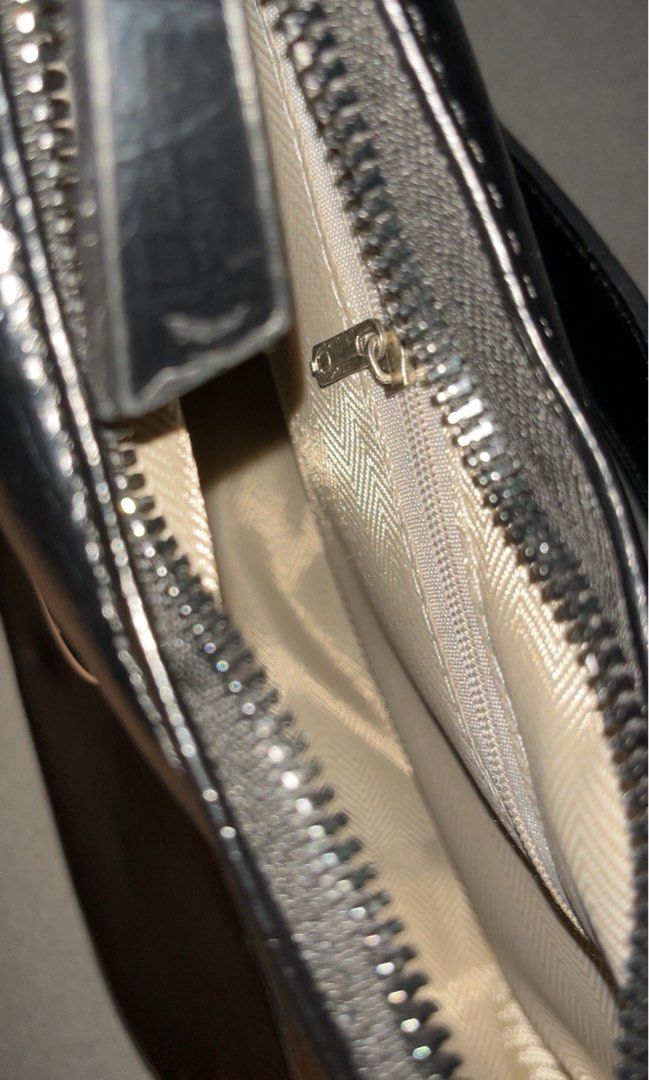 Black Patent Leather Shoulder Bag with Silver Hardware (Category: Shoulder Bags) located in Cavite. Submitted by Elyseen (Listing ID 1444300799, Image 3). Description: - Shiny black leather shoulder bag - Adjustable strap and free long strap - Barely used it .
