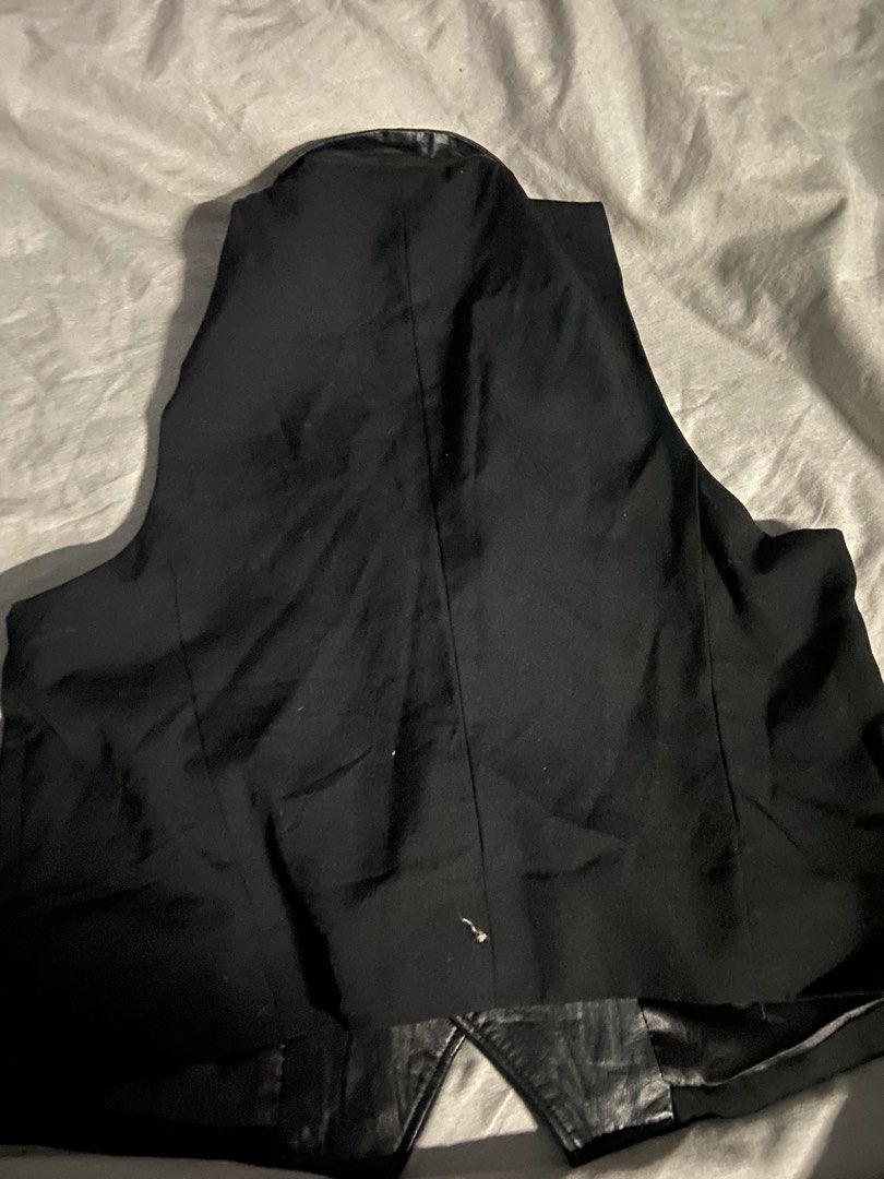 Black Shawl Collar Vest with Skull Lining (Category: Others Tops) located in Manila. Submitted by nhclknt (Listing ID 1444224285, Image 3). Description: - Black vest with a stylish shawl collar. - Features a cool skull graphic lining. - Button-up front closure. - Convenient side pockets. - Ideal for layering or as a standalone statement piece..