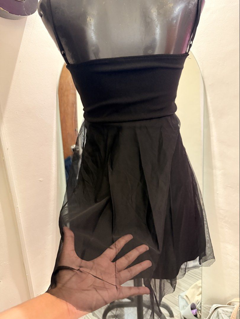 Black Strapless Tulle Dress (Category: Dresses) located in Caloocan City. Submitted by prettyplease000 (Listing ID 1444280605, Image 2). Description: small to med frame body hugging adjustable strap - Elegant black strapless dress - Flattering sweetheart neckline - Fitted bodice for a sleek silhouette - Sheer tulle overlay on the skirt - Adjustable thin straps for a perfect fit - Ideal for parties, events, or a night out - Designed to look great 