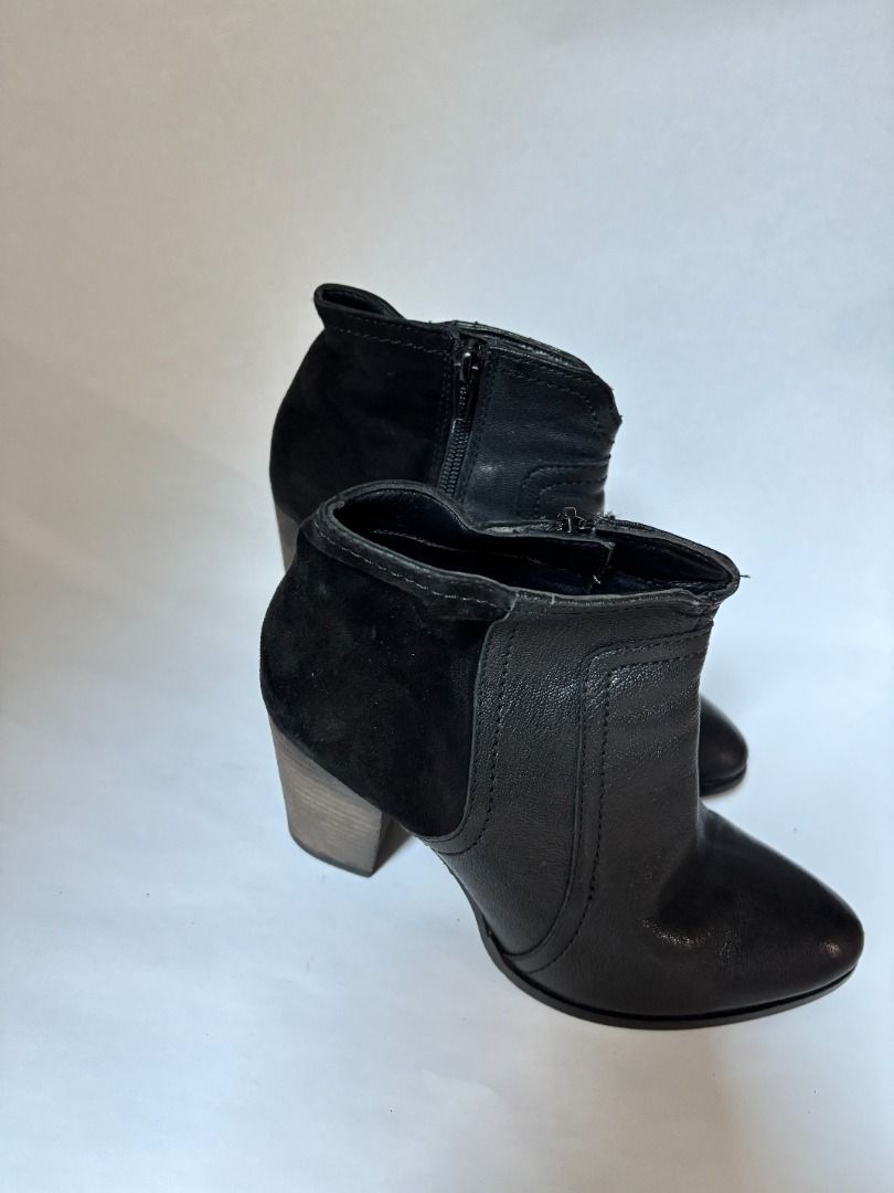 Black Textured Ankle Boots with Zipper (Category: Boots) located in Taguig. Submitted by hokie6923 (Listing ID 1444250311, Image 3). Description: - Stylish black ankle boots - Textured finish with a slight shine - Convenient side zipper for easy wear - Elegant pointed toe design - Versatile for dressing up or down.