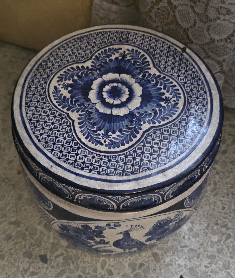 Blue & White Ceramic Peacock Garden Stool/ Planter Stand (Category: Vases & Decorative Bowls) located in Quezon City. Submitted by mystictiger.019d9c (Listing ID 1444186155, Image 2). Description: - Decorative ceramic garden stool/ planter stand has a blue and white glazed finish. - This piece features a detailed peacock and floral motif within circular medallions. - The top surface is decorated with a central floral pattern surrounded by geometr