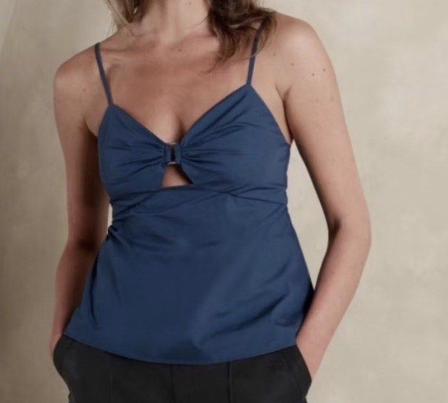 Blue Bow Front Cutout Tank Top (Category: Sleeveless) located in Quezon City. Submitted by itemsbyj (Listing ID 1444138781, Image 1). Description: - small-medium.