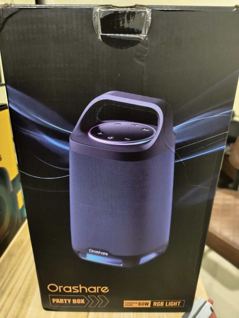 Orashare Bs21 Party Bass Bluetooth Speaker (Category: Soundbars, Speakers & Amplifiers) located in Manila. Submitted by katie09871234 (Listing ID 1444248841, Image 1). Description: - Blue portable speaker - Fabric texture - Sturdy top handle - Easy-access top controls - Comes with a mouse - Includes fun stickers - Ideal for music on the go.