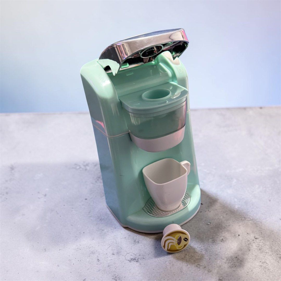 Bo40 blue Playgo toy coffee maker that features a realistic water dispensing function (Category: Coffee Machines & Makers) located in Angeles City. Submitted by zyeplustradings (Listing ID 1444214779, Image 2). Description: blue Playgo toy coffee maker that features a realistic water dispensing function The set includes a matching mug for imaginative play, designed specifically for toddlers. It operates with batteries to power features like sound