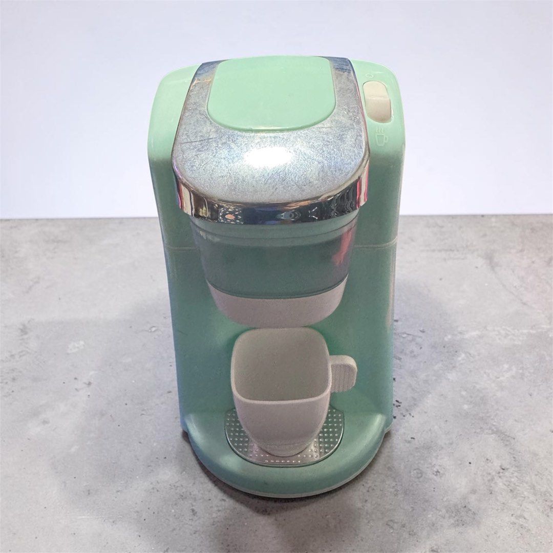 Bo40 blue Playgo toy coffee maker that features a realistic water dispensing function (Category: Coffee Machines & Makers) located in Angeles City. Submitted by zyeplustradings (Listing ID 1444214779, Image 1). Description: blue Playgo toy coffee maker that features a realistic water dispensing function The set includes a matching mug for imaginative play, designed specifically for toddlers. It operates with batteries to power features like sound
