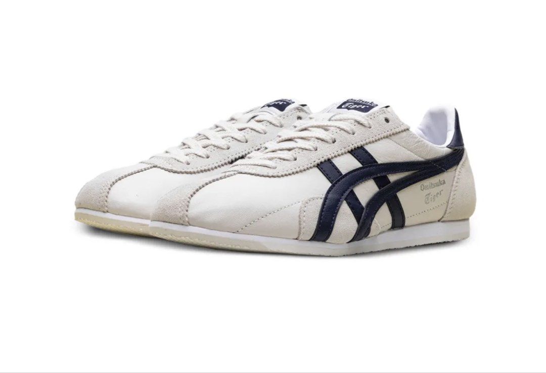 (Bought from Japan 🇯🇵) Onitsuka Tiger Mexico 66 Cream Navy Sneakers (Category: Sneakers) located in Singapore. Submitted by thehappyfamilykvn (Listing ID 1444250030, Image 1). Description: - Classic Onitsuka Tiger Mexico 66 sneakers - Color: Cream with navy blue stripes - Features suede accents on toe and heel - Made in Indonesia - Size: 39 EU / 6 US.