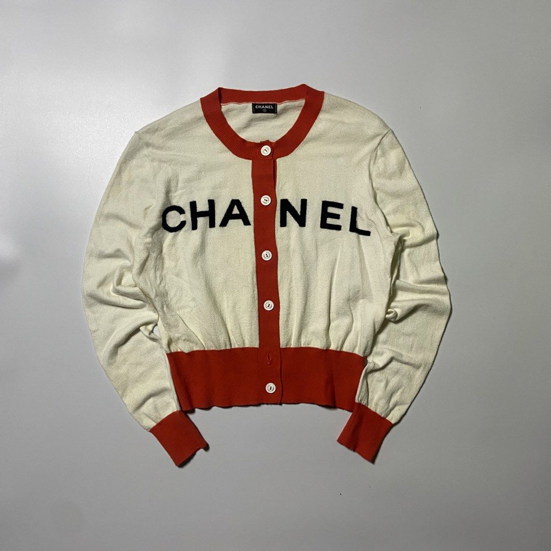 Chanel cardigan knit (Category: Luxury Apparel) located in Cabatuan. Submitted by moneydimes (Listing ID 1444294886, Image 1). Description: 19 x 21 dimes Missing 1 botton and washtag 10/10 Color rate .