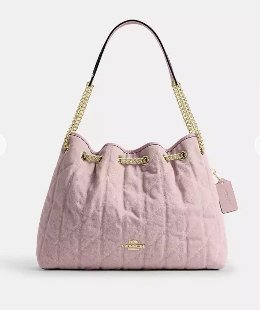 Coach Quilted Pink Shoulder Bag with Chain Strap (Category: Luxury Bags & Wallets) located in Angono. Submitted by tinnedj (Listing ID 1444244709, Image 1). Description: Pre-order Brand new - Coach shoulder bag - Lovely light pink color - Quilted design with gold chain accents - Secure drawstring closure - Includes matching leather tag - Versatile for everyday or evening wear On hand Canada. ETA on ph on July.
