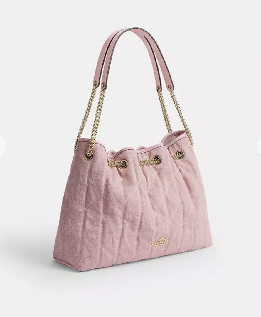 Coach Quilted Pink Shoulder Bag with Chain Strap (Category: Luxury Bags & Wallets) located in Angono. Submitted by tinnedj (Listing ID 1444244709, Image 3). Description: Pre-order Brand new - Coach shoulder bag - Lovely light pink color - Quilted design with gold chain accents - Secure drawstring closure - Includes matching leather tag - Versatile for everyday or evening wear On hand Canada. ETA on ph on July.