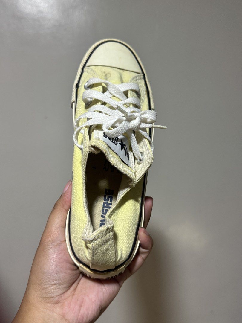 Converse All Star Low Top Sneakers Yellow (Category: Sneakers) located in Naga. Submitted by kalibaby (Listing ID 1444129733, Image 2). Description: - Classic Converse All Star low tops - Light yellow canvas with white laces and sole - Iconic All Star logo on the heel - Great for casual, everyday wear - Pre-loved with plenty of life left - Ready for a new home.
