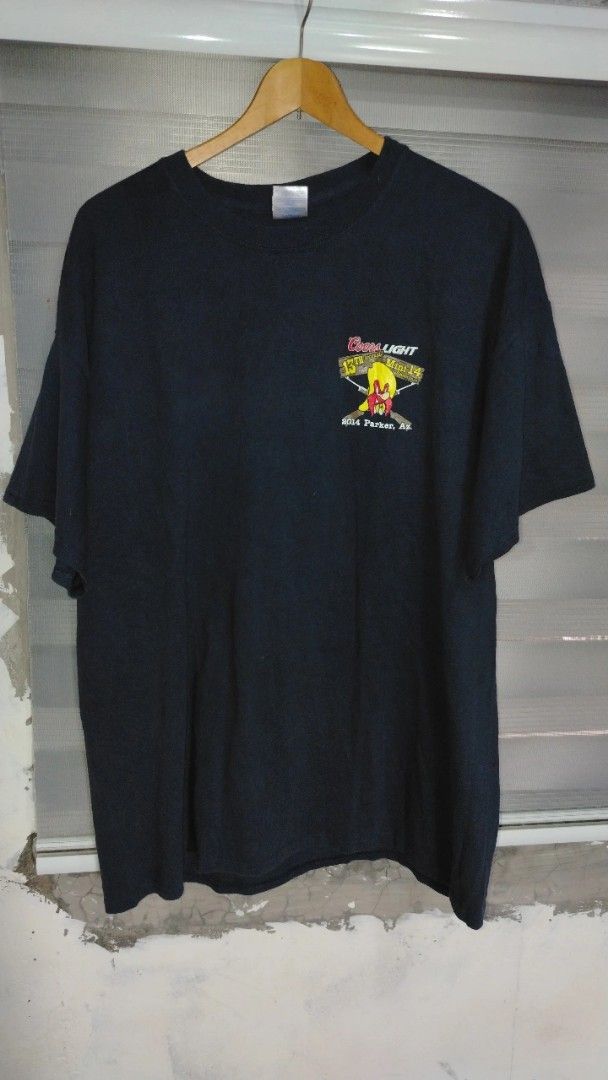 Coors Light Mini 14 Shoot Out 2014 T-Shirt (Category: Tshirts & Polo Shirts ) located in Cavite. Submitted by ukaynglahat (Listing ID 1444130511, Image 1). Description: - Black t-shirt from the 13th Annual Coors Light Mini 14 Shoot Out - Event held in Parker, AZ in 2014 - Features a fun graphic on the back with a cartoon character and firearms - Small embroidered logo on the front - Made by Gildan - Great for collectors or fans of the event.